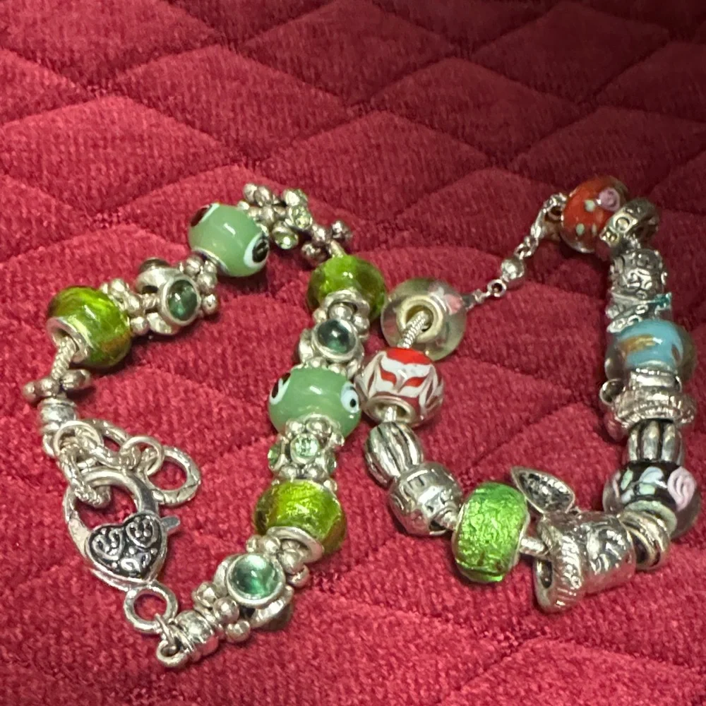 2 glass Bead and Elegant Silver Bracelets. In great condition.